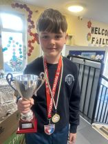 Elijah and Ailbe share some silverwear from their recent trips!